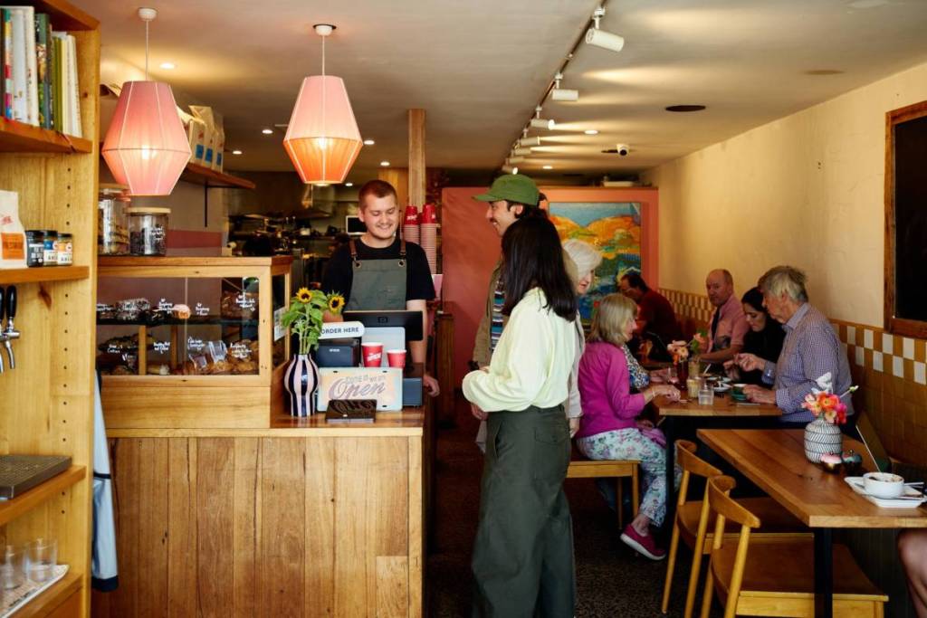 couple ordering something from the barista at Early Nancy