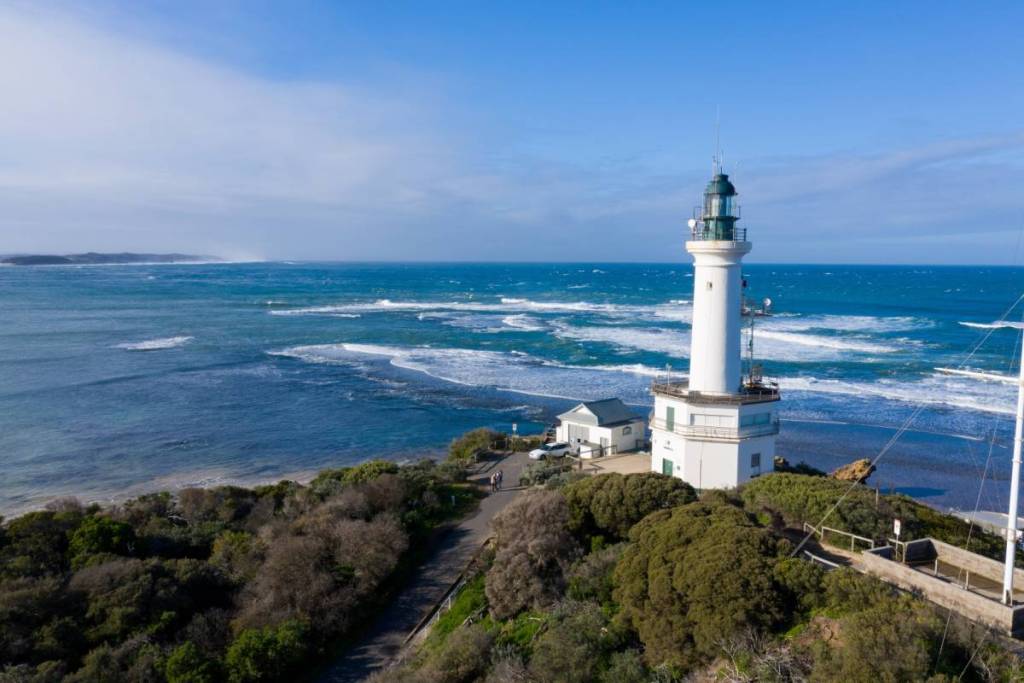 view of Point Lonsdale Lighthouse, facing the other side of the bay, showing the waves of The Rip