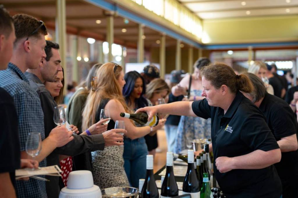 people tasting wine at Italian Festa & Expo