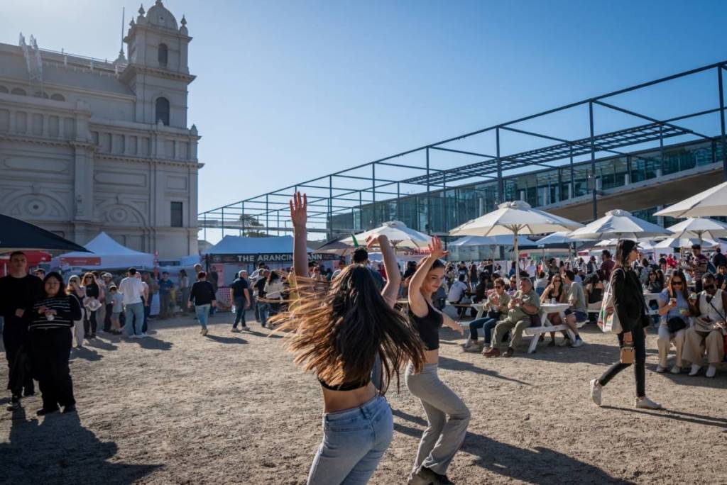 women dancing outside at Italian Festa & Expo