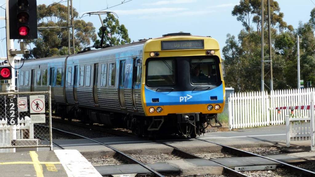 train on the Upfield at a level crossing