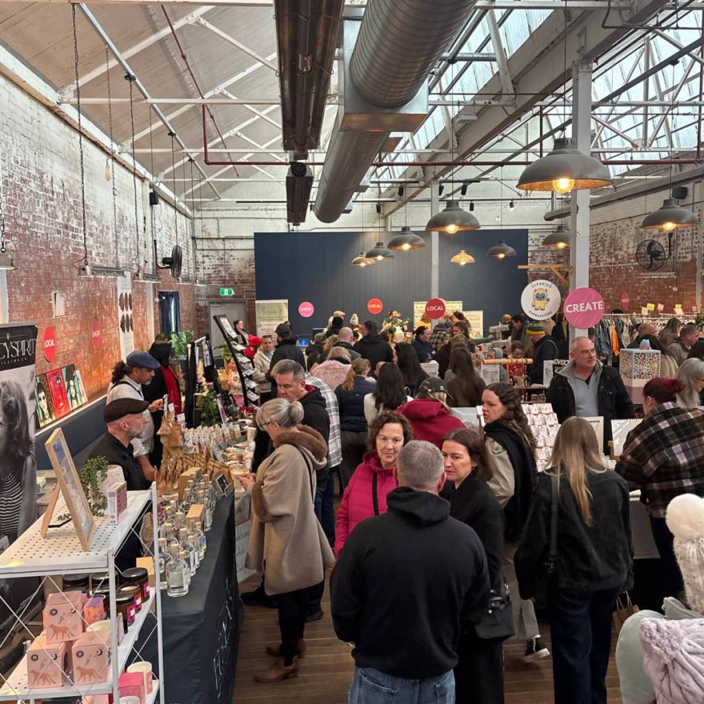 people browsing through design market in Geelong