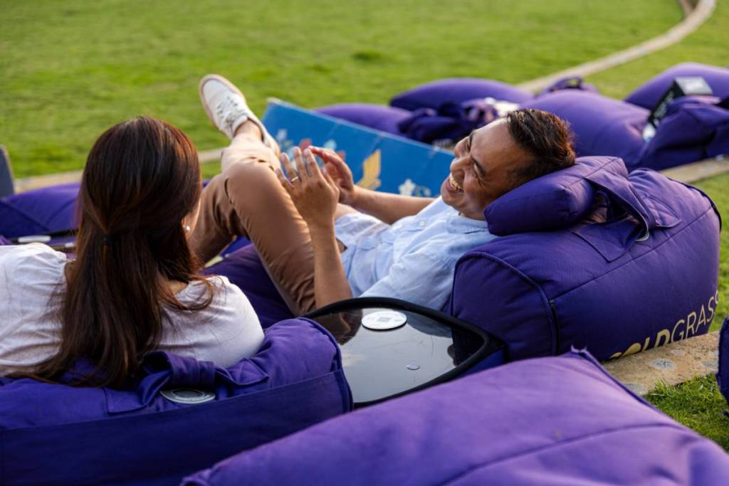 couple relaxing on bean bags at Moonlight Cinema