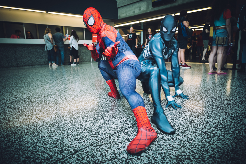 Spiderman cosplayers at a pop culture fan convention