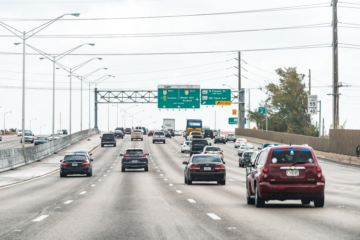 A shot of cars driving down the expressway