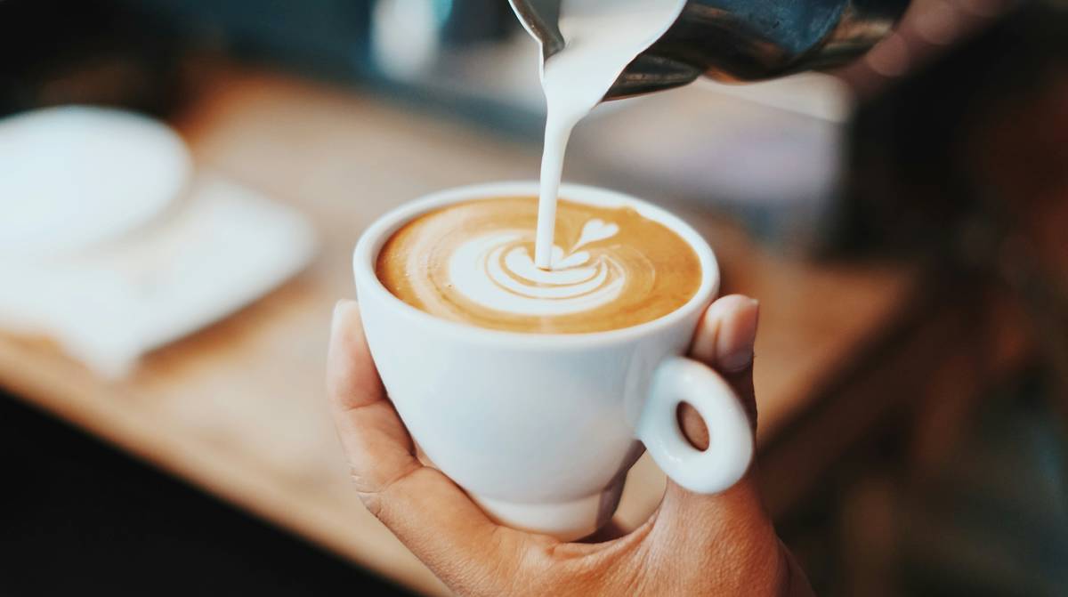 coffee being poured at coffee shop