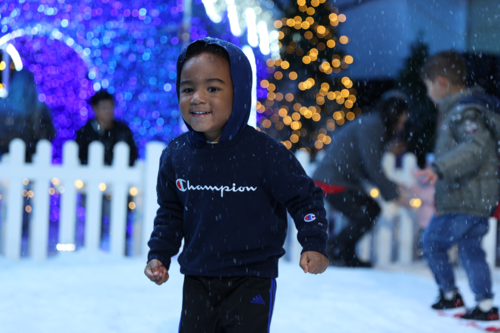 Child playing in snow