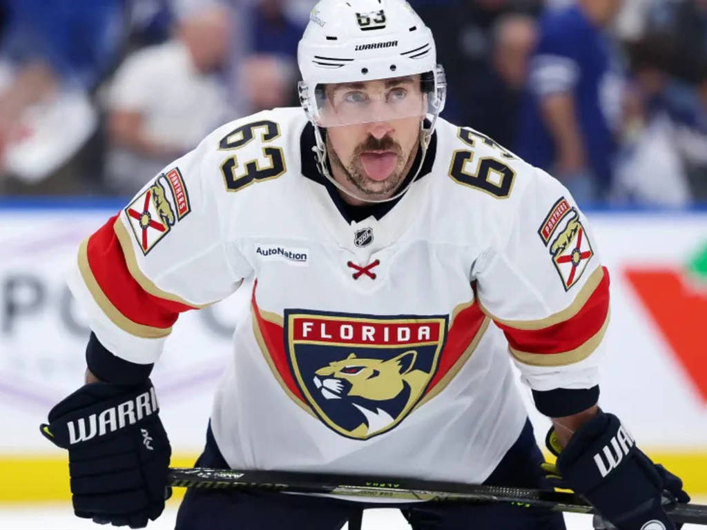 L'image montre Brad Marchand pour l'histoire de son voisin