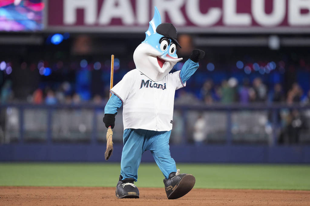 MIAMI, FLORIDA - JUNE 04: Miami Marlins mascot Billy the Marlin walks with a broom on the field after the Miami Marlins defeated the Oakland Athletics and swept the series at loanDepot park on June 04, 2023 in Miami, Florida