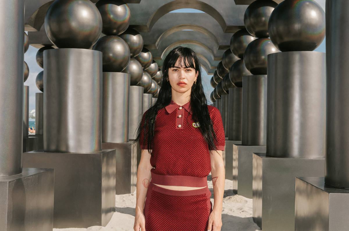 Pilar Zeta stands in front of The Observer Effect