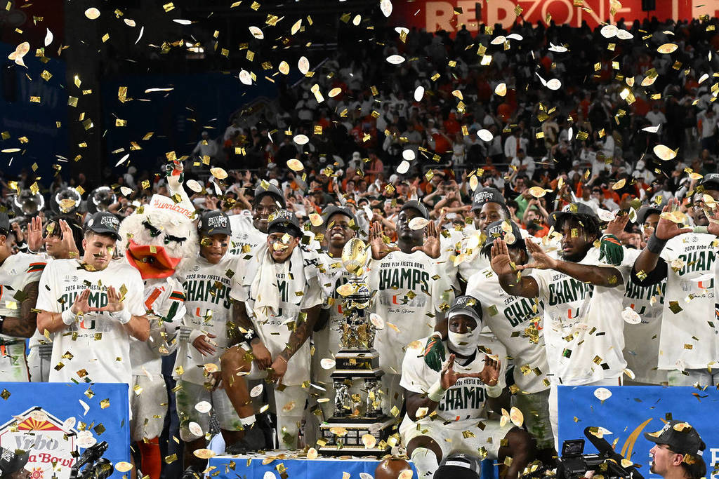 GLENDALE, ARIZONA - JANUARY 08: The Miami Hurricanes celebrate after the game against the Ole Miss Rebels during the 2025 College Football Playoff Semifinal at the VRBO Fiesta Bowl at State Farm Stadium on January 08, 2026 in Glendale, Arizona. The Hurricanes defeated the Rebels 31-27.