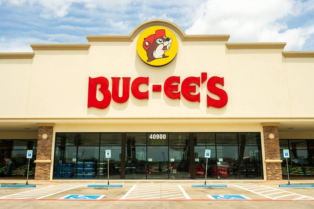 BASTROP, TEXAS - CIRCA MARCH 2019: A Buc-ee's gas station and convenience store is visited by hundreds of hungry patrons on a busy afternoon.
