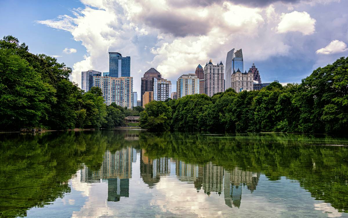 A view of the Atlanta, Georgia skyline as seen from the shores of Lake Clara Meer in Piedmont Park.