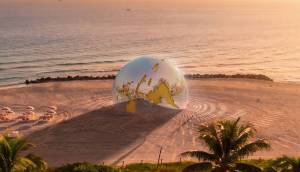 A free 44-foot-wide mirrored Earth installation will tower over the sands of Miami Beach this December for Art Week