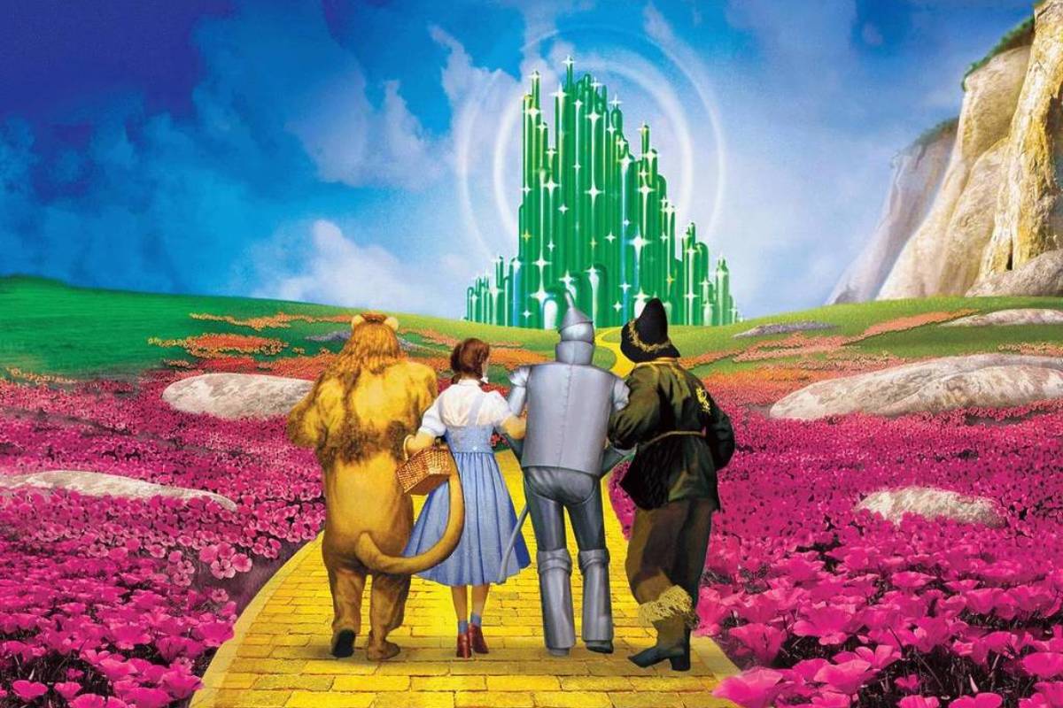 Dorothy, the Tin Man, Scarecrow and Cowardly Lion walking down the Yellow Brick Road in The Wizard of Oz