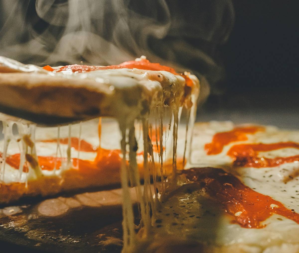 Pizzastück mit Dampf für die beste Pizza in München