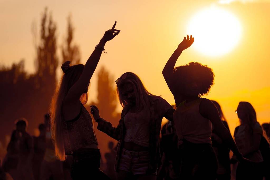 Partiers at sunset