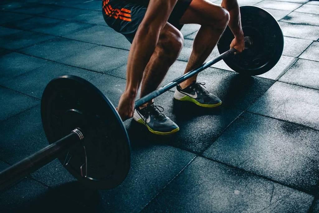 man with a barbell