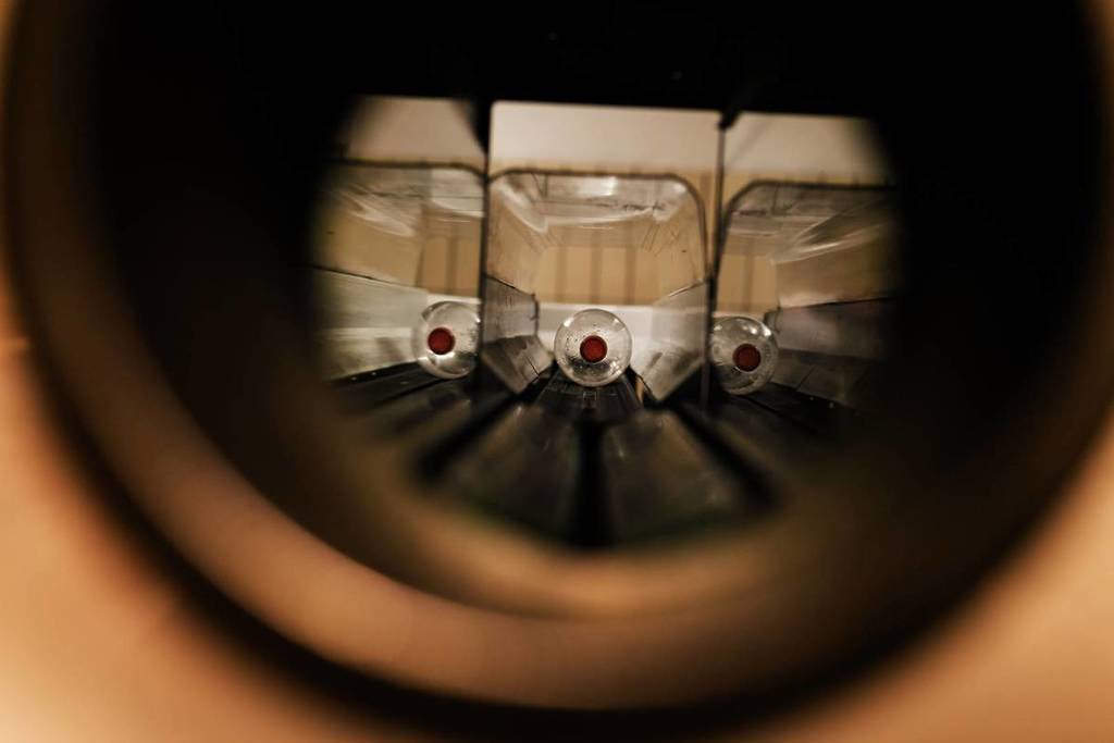 a bottle in a deposit machine, reusable system