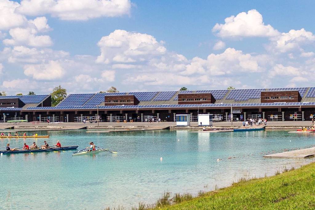 Rowing boats train at the regatta course.