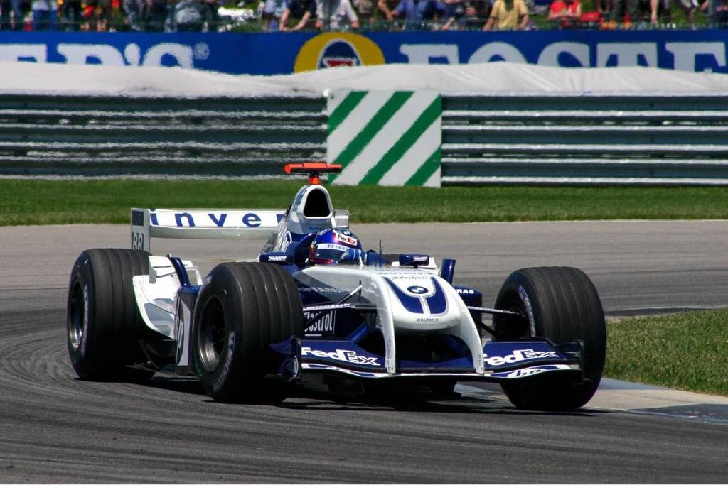 Williams FW26 race car on the track.