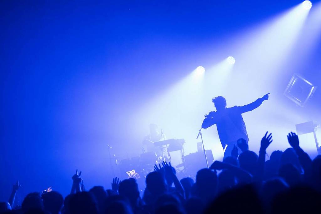 person plays a concert