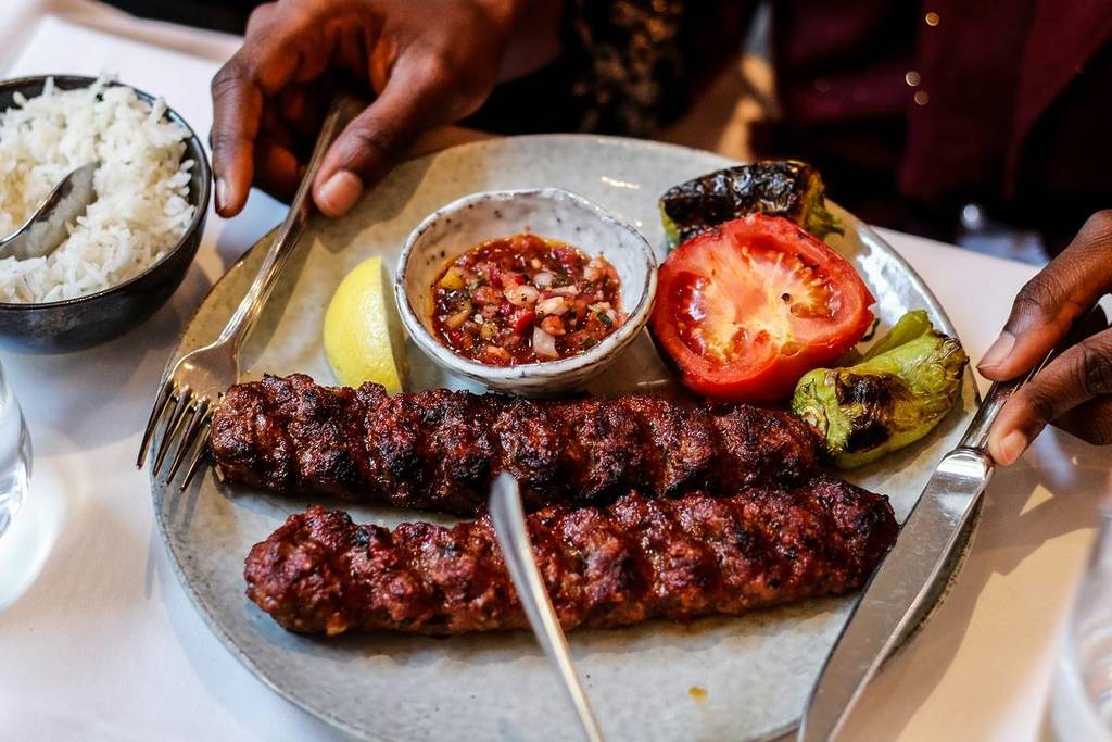 lamb skewers with vegetables and rice