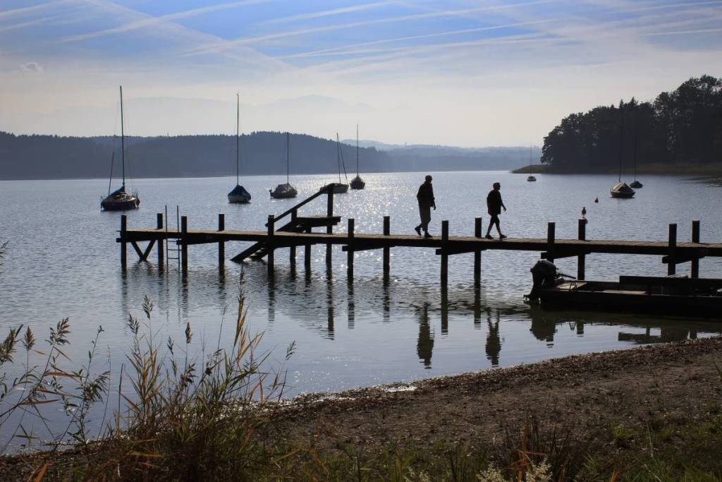 people on a dock at Simssee