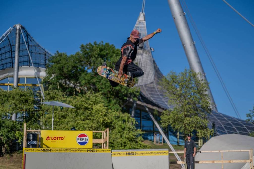 Skateboarders at the Munich Mash in front of the Olympic Stadium