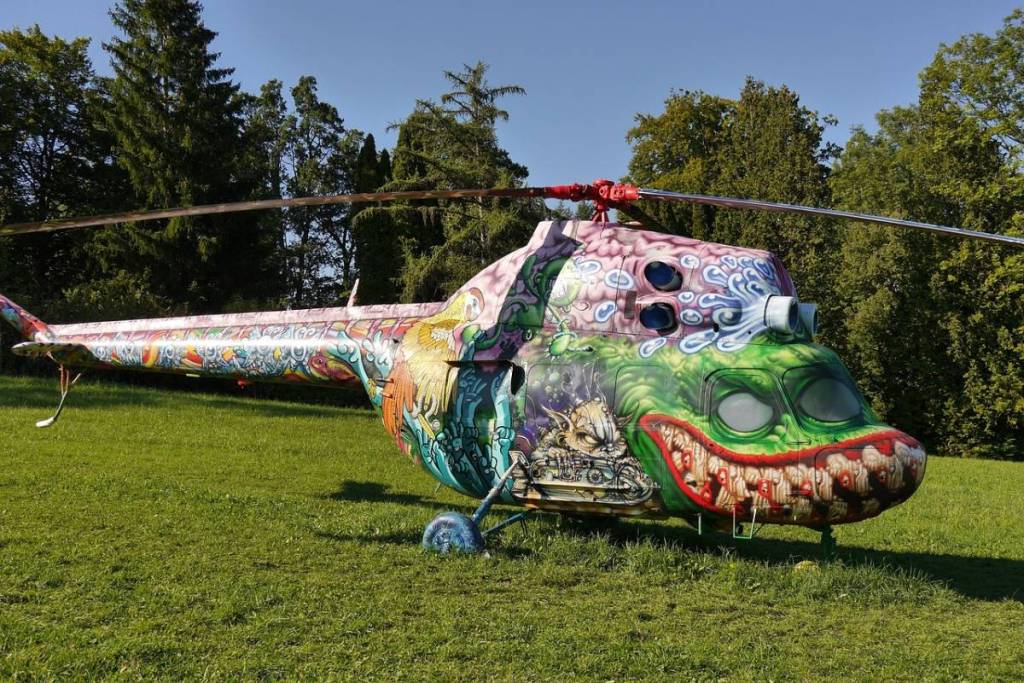 Colorful helicopter in the garden of the Buchheim Museum of Imagination