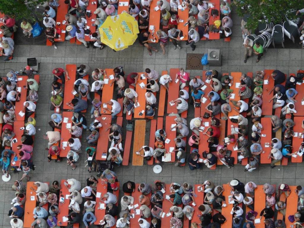 people on beer benches, seen from above