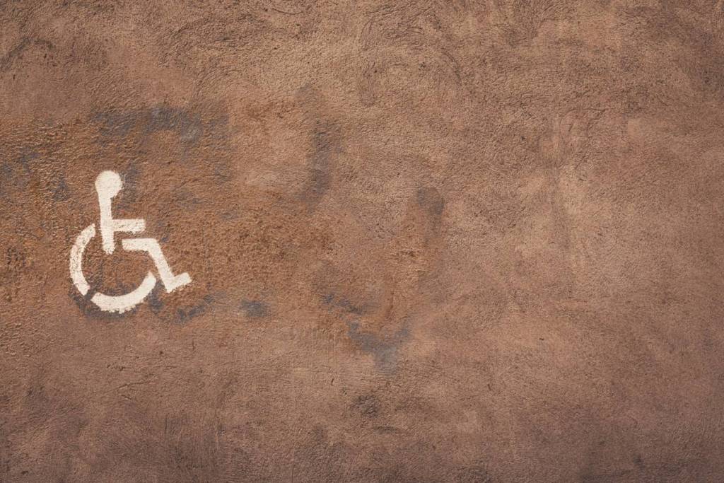 Wheelchair symbol on a wall