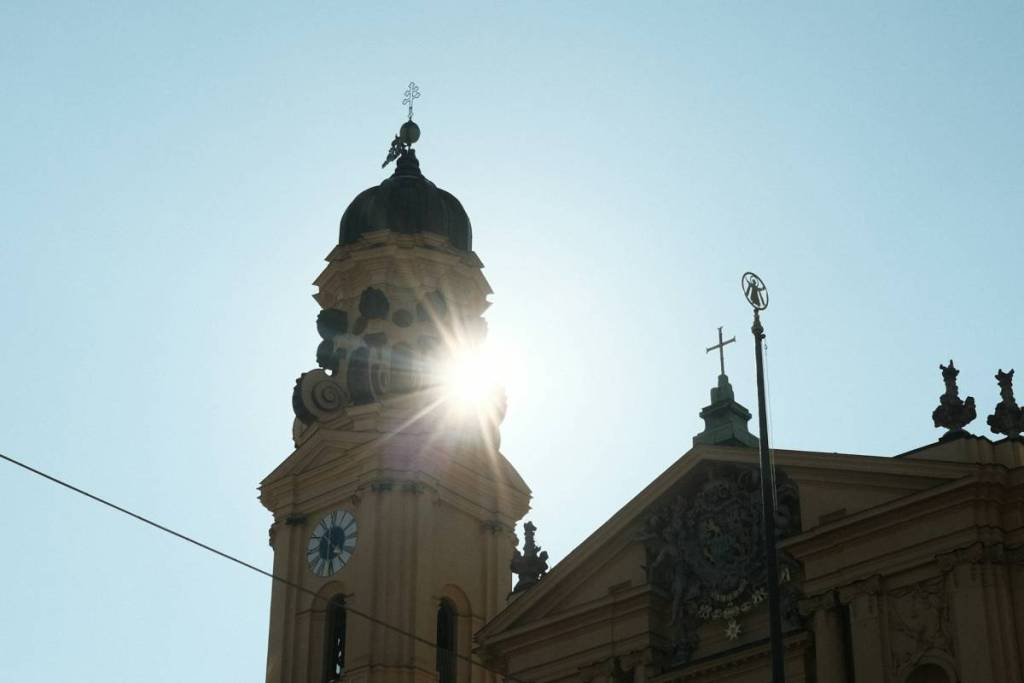 The sun peeks out from behind the Theatinerkirche