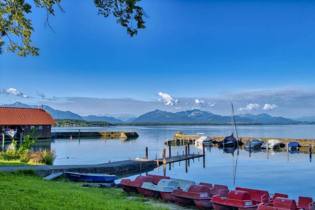 A lakeside resort on Lake Chiemsee with boats