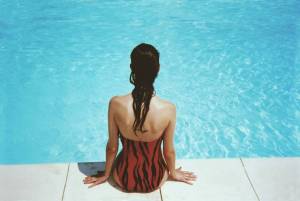 Swimming pool meets beach club: At this idyllic Munich outdoor pool, you can relax on 540 metric tons of golden sand or zoom down the 50-meter slide into the cool water