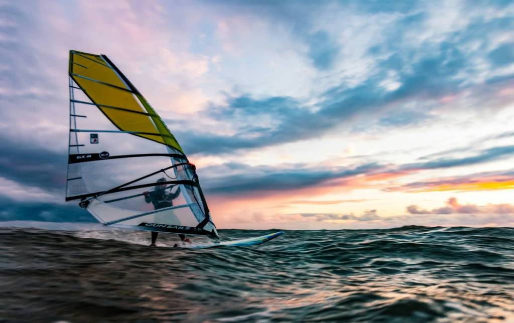 Windsurfers at sunset