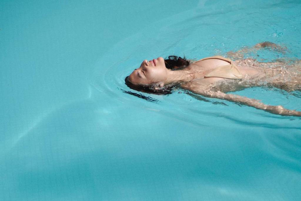 woman swimming in the pool