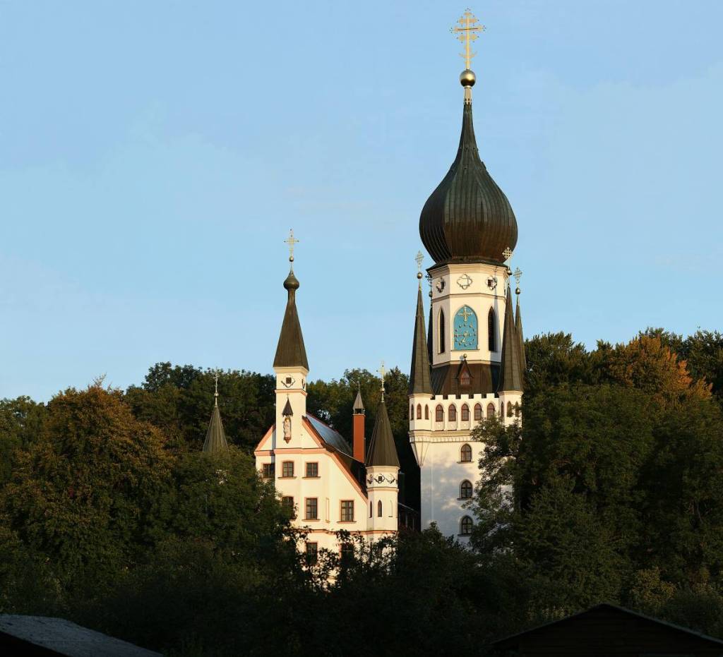 Archiconvent of the Templars with its onion-domed tower peeking out from among the trees
