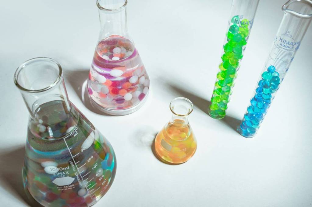 test tubes and flasks filled with colorful contents
