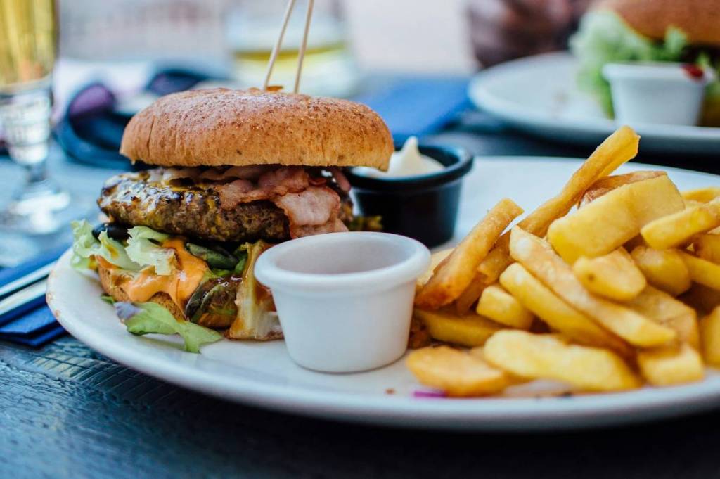 burgers with fries and sauce