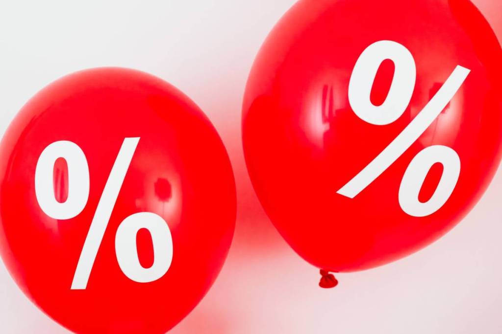 red balloons with percentage signs