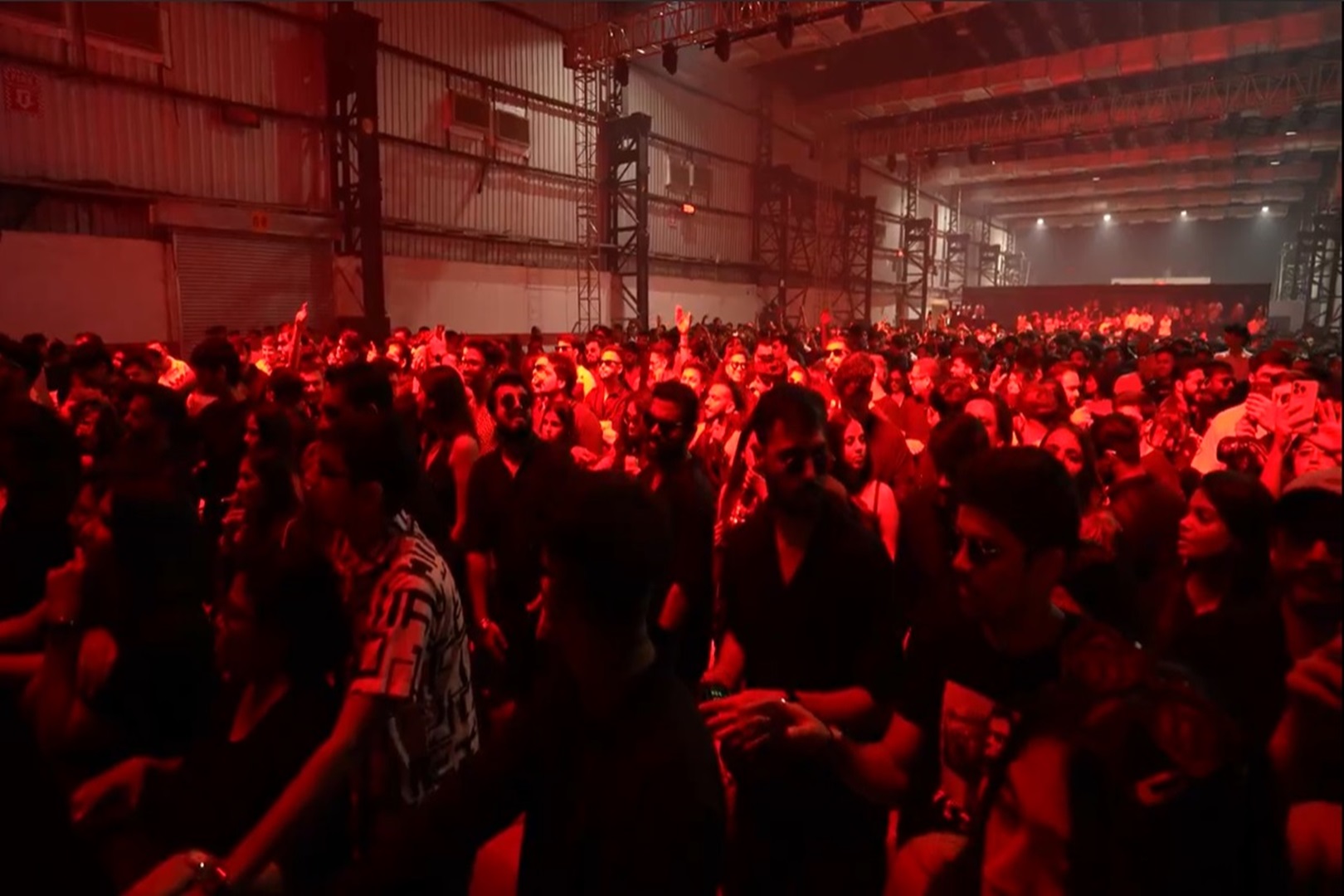 crowd shot of people dancing at those who know they know