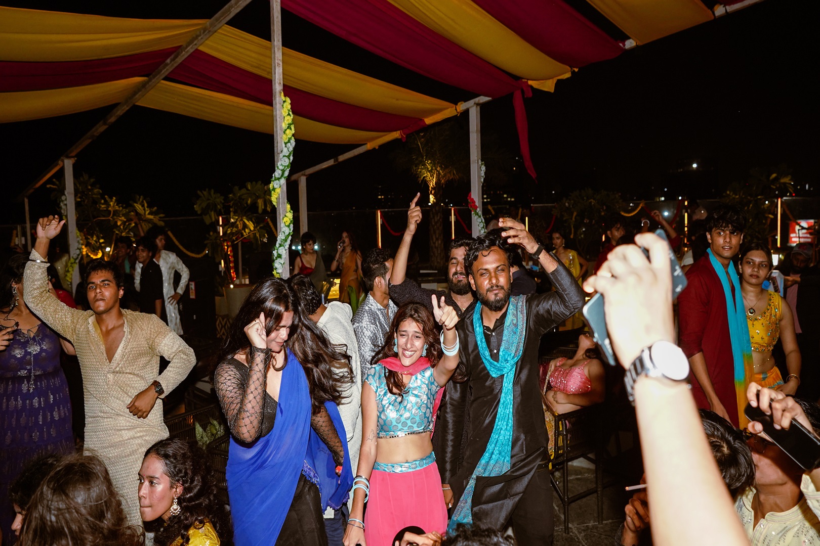 People dancing at fake wedding in Mumbai is one of the best things to do in July