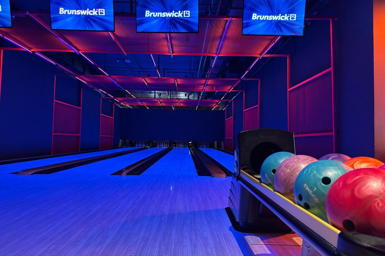 Gamera's neon lit bowling alley