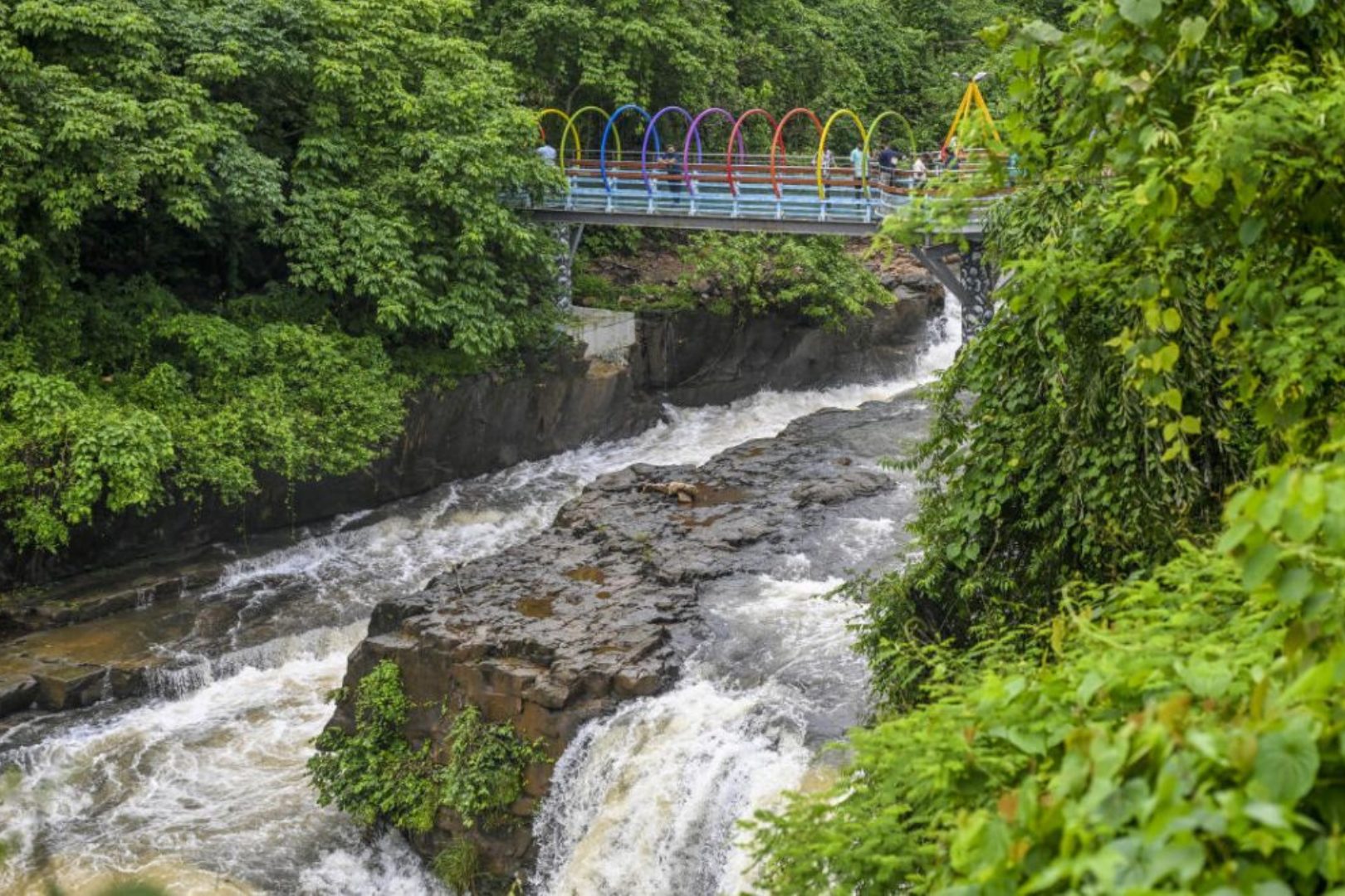 Glass bridge over Napne Waterfall