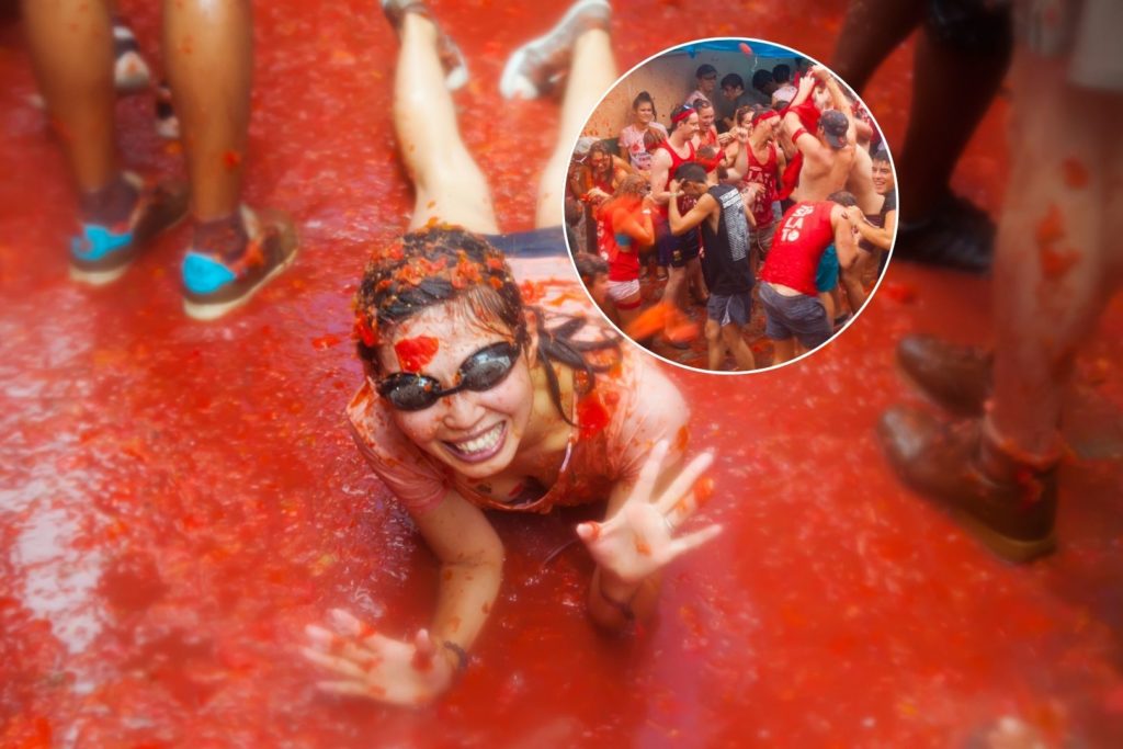 A shoto of a woman enjoying the La Tomatina Festival which is coming to Mumbai