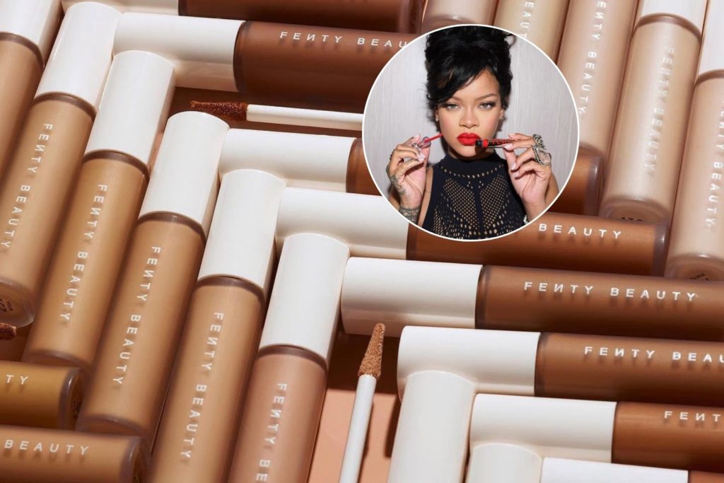 An inset image of Rihanna using Fenty lipstick and outlay of Fenty foundations in all shades