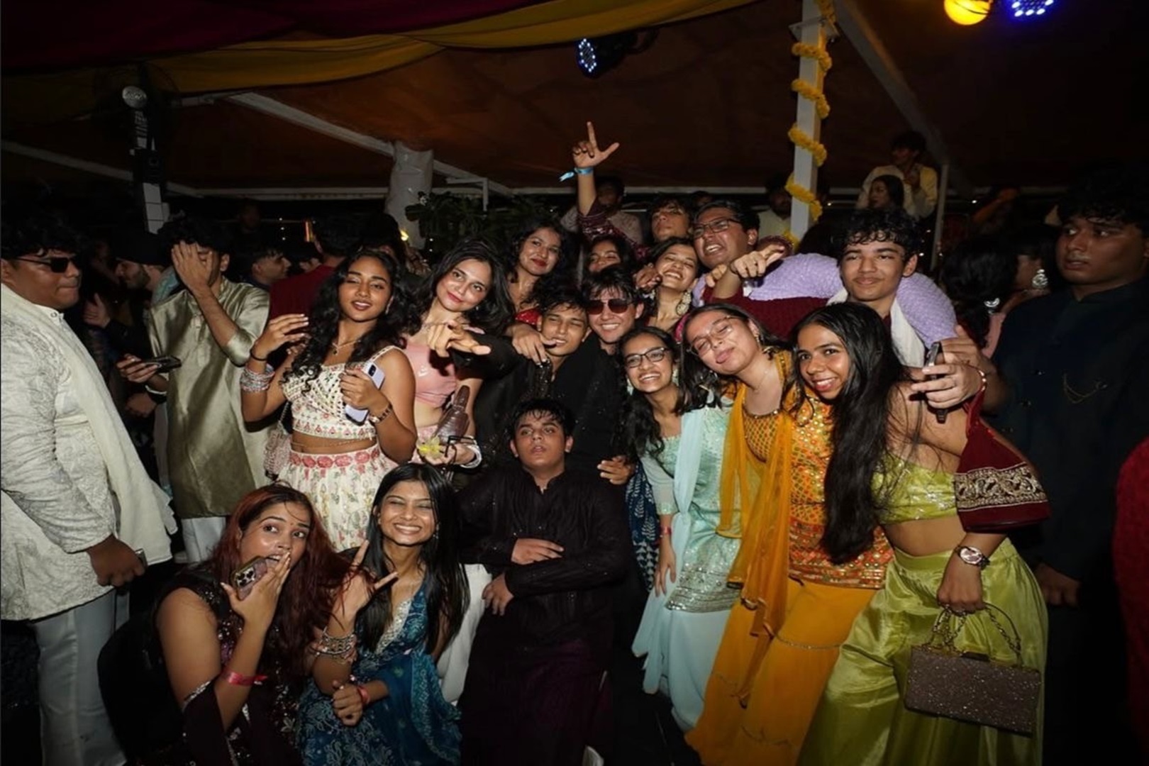 Taylor Swift engagement fake sangeet, people dancing