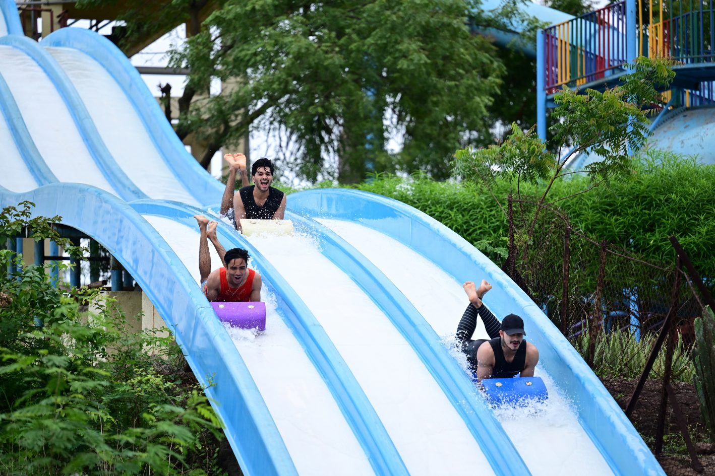 Guests sliding down a water slide at Diamond Water Park