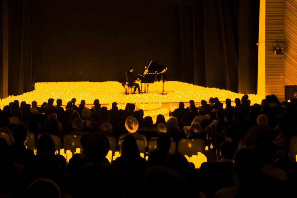 A pianist performing at a Candlelight concert in New Delhi